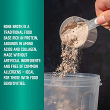 Chicken bone broth protein powder pouring from a measuring cup