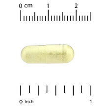Yellow-green veggie capsule with size scale markings