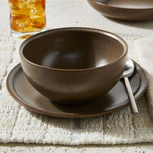 Brown stoneware bowl on matching plate, speckled glaze