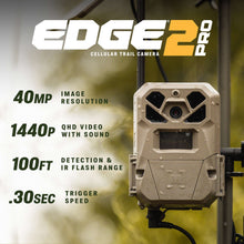 Beige cellular trail camera front view with antenna and rugged weatherproof casing.