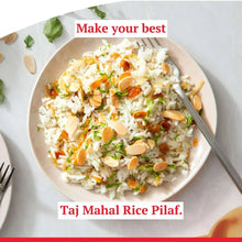 Bowl of basmati rice pilaf with vegetables and sliced almonds