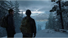 The Last of Us Part II Remastered PS5 game: two survivors standing in snowy woods