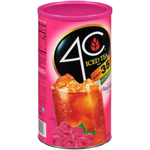 Iced tea mix can front with raspberry flavor and glass of tea