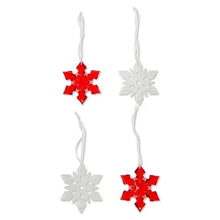 Set of four mini snowflake ornaments in red and white, two per color on strings