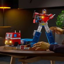 Transformers 3D model kit puzzle with red Optimus Prime robot and red truck pieces
