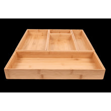 Natural bamboo drawer organizer tray with multi-part divider grid and open center