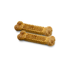Two tan-brown textured edible dog chew bones