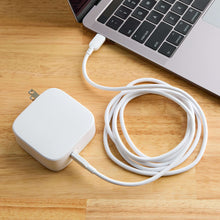 White USB-C laptop charger with long USB-C cable and compact adapter
