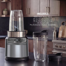Personal blender with stone silver base and clear 24 oz to-go cup