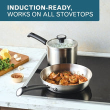 Induction-ready stainless stockpot and frying pan with black handles