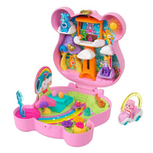 Pink compact travel playset with rainbow slide and mini character figures