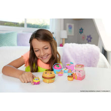 Food-theme micro doll compacts with tiny vehicles and accessories on a play surface