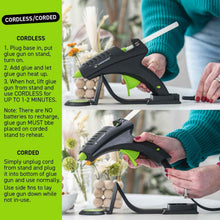 High-temperature hot melt glue gun, black with green accents, shown being used