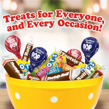 Assorted candy variety in a yellow bowl with Tootsie Roll, Dots, and Fruit Chews