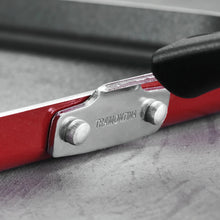 Metallic red nonstick fry pan with riveted handle bracket and Tramontina logo
