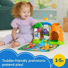 Toddler dinosaur playset with three figures, palm trees, cave, and colorful play mat