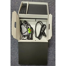 Streaming media player retail box with remote and power cables
