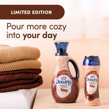 Downy Cozy laundry scent booster beads bottle set with stacked folded towels