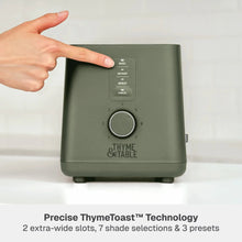 Dusty moss 2-slice toaster front with shade dial and buttons