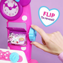 Pink flip-open toy kitchen counter with oven window and pull handle