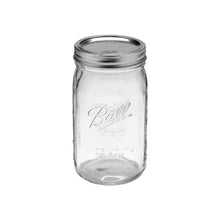 Wide-mouth glass mason jar with silver lid and band, clear quart jar