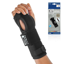 Black wrist brace with adjustable strap and wrist support on a hand