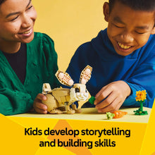 Kids assembling a LEGO Creator 3-in-1 bunny model with flower and carrot pieces