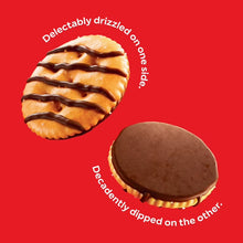 Fudge drizzled mini crackers, one drizzled and one fully chocolate dipped