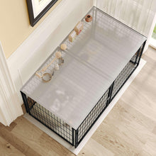 Black dog kennel with white tray-style base and wire walls, door area visible.