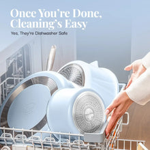 Ceramic nonstick cookware set with light blue pots and detachable handles on dish rack