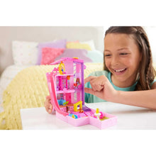 Pink dollhouse compact playset with open rooms and micro dolls