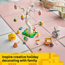 LEGO Easter tree playset pieces on a tile floor, with bunny and chick models