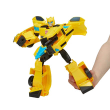 Yellow and blue Bumblebee-style robot action figure posed with wing shoulders.