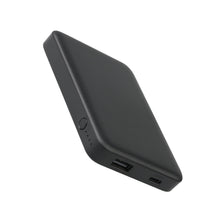 Black portable power bank with USB-C and USB-A ports and an LED indicator