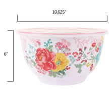 Pink floral melamine mixing bowl with a clear lid, white exterior