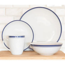 Ceramic dinnerware set: large bowl, salad plate, and mug with blue stripe accents