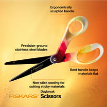 Scrapbook scissors with red patterned handle and cream loops, non-stick blades