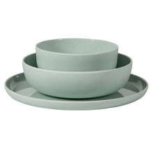 Green melamine bowl set, stacked bowls on a matching plate