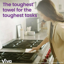 Viva paper towels on countertop while a person cleans