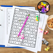 Animal Eraser Pals erasers near a math worksheet with multiple characters visible