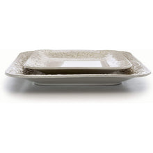 Ivory square dinner plate set with embossed lotus and lattice pattern, stacked
