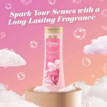 Caress Daily Silk body wash bottle with long-lasting fragrance graphic and foam bubbles