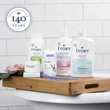 Ivory body wash multipack display with four bottles on a wooden shelf