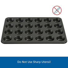 Gray mini muffin pan with 24 nonstick cavities and smooth flat rim