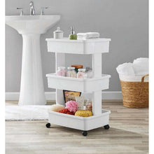 Arctic white 3-tier plastic rolling cart with three open shelves and caster wheels for toiletries