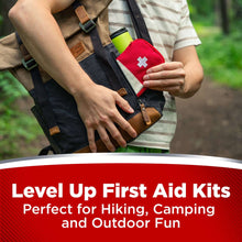First aid kit bag with red cross pouch and hiking supplies