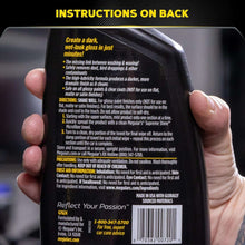 Detailer spray bottle back label held in hands, product information panel