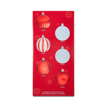 Boxed set of shatterproof Christmas ornaments in red and white with mixed designs