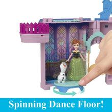 Pink and blue castle dollhouse with spinning dance floor and Anna in green dress