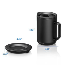 Black warming coffee mug with lid and handle, shown with coaster size measurements